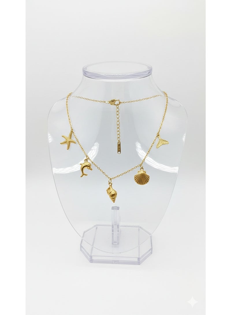 ورد سلسلة ستانلس ستيل ذهبية بتصميم عناصر البحر - دلايات صدف ودولفين. - Image 2